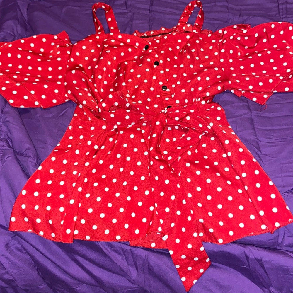 Fun polka dot cold shoulder shirt!